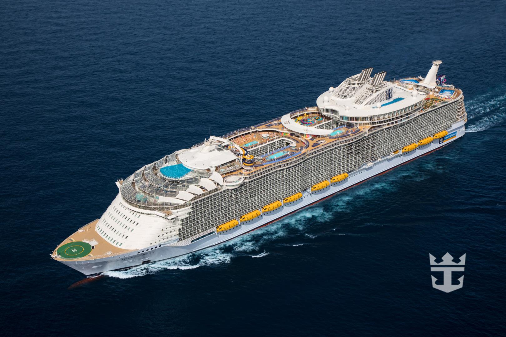 Aerial view of Symphony of the Seas at sea offshore Barcelona, Spain